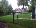 Elegant black powder coated chain link fence at a million dollar West Vancouver home